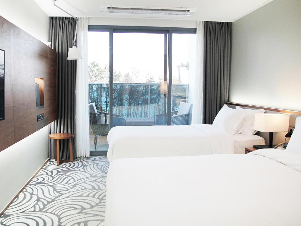 Postel nebo postele na pokoji v ubytování Best Western Plus GyeongJu