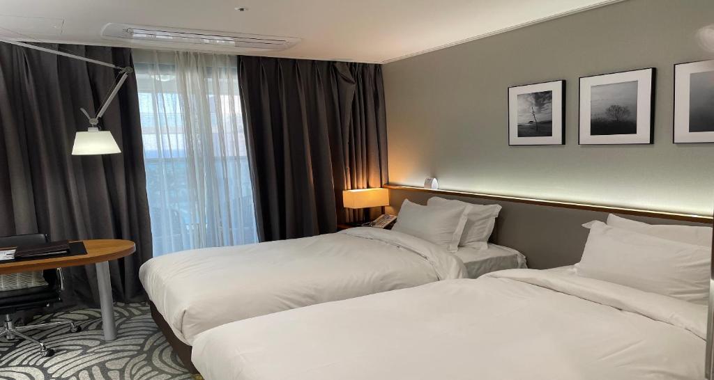 Postel nebo postele na pokoji v ubytování Best Western Plus GyeongJu