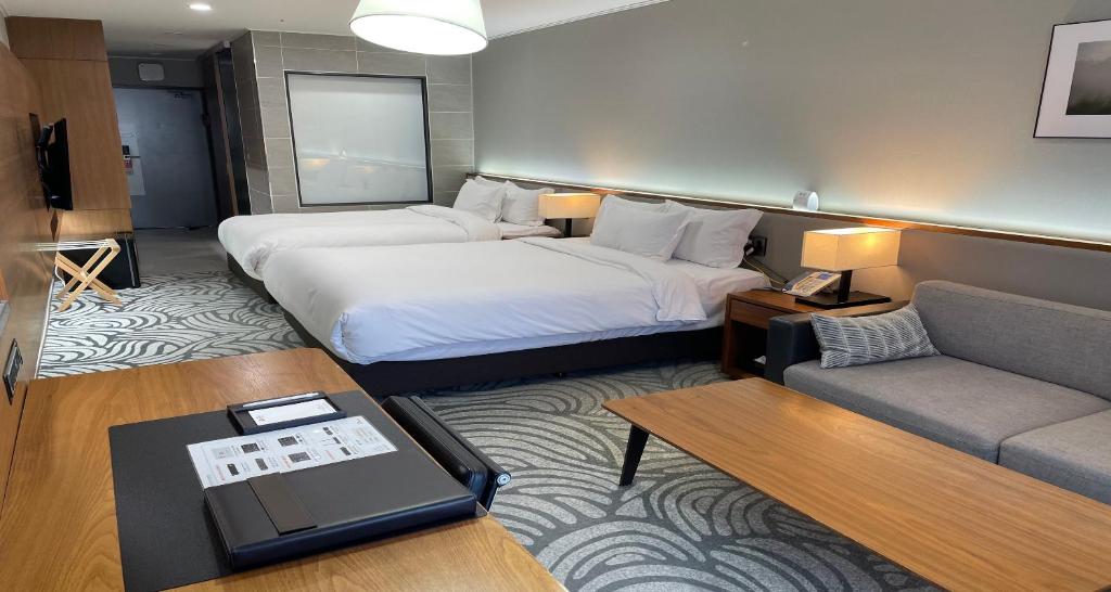 Postel nebo postele na pokoji v ubytování Best Western Plus GyeongJu
