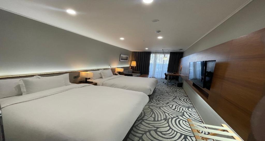 Postel nebo postele na pokoji v ubytování Best Western Plus GyeongJu