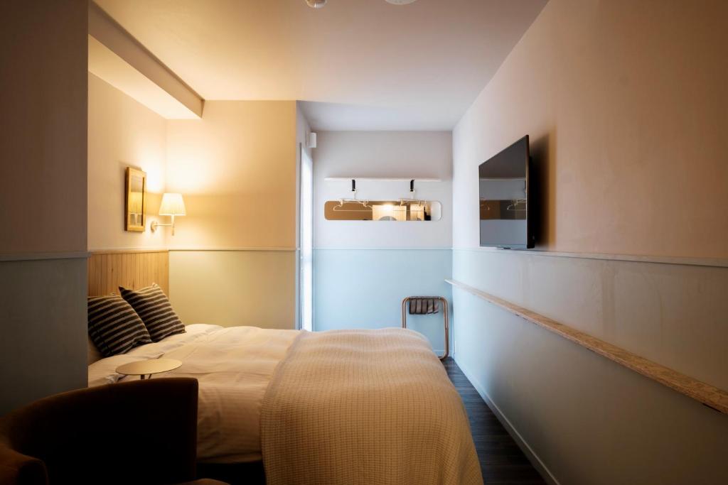 Postel nebo postele na pokoji v ubytování miss morgan hotel