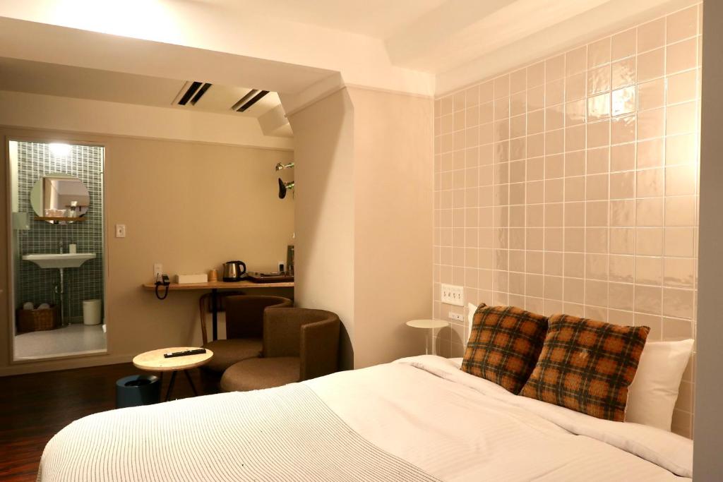 Postel nebo postele na pokoji v ubytování miss morgan hotel