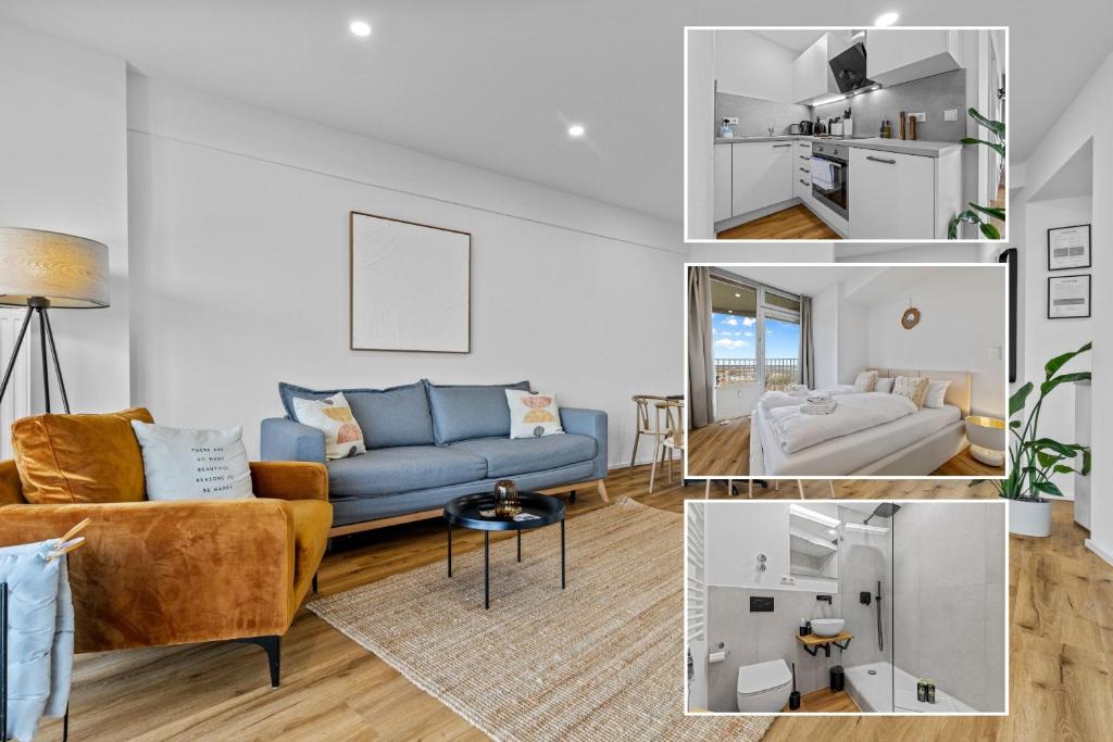 a living room with a blue couch and a table at ma suite -NEW-23Floor-FantasticView-Center in Augsburg