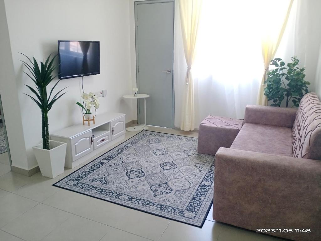 Χώρος καθιστικού στο SUNSURIA KLIA HOMESTAY