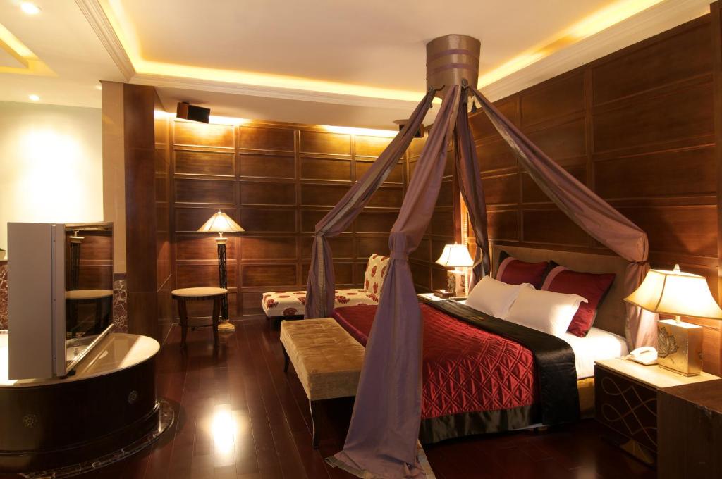 Postel nebo postele na pokoji v ubytování Dongfeng Motel