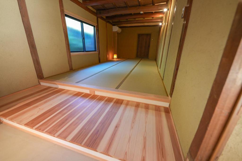 Fotografie z fotogalerie ubytování 奥明日香古民家一棟貸し宿 弥栄 Yasaka v destinaci Asuka