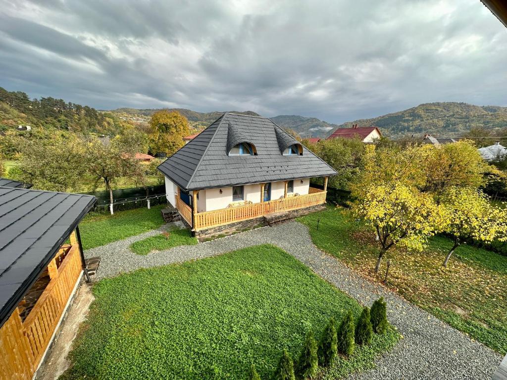 an aerial view of a house with a roof at La Bunici in Vişeu de Sus