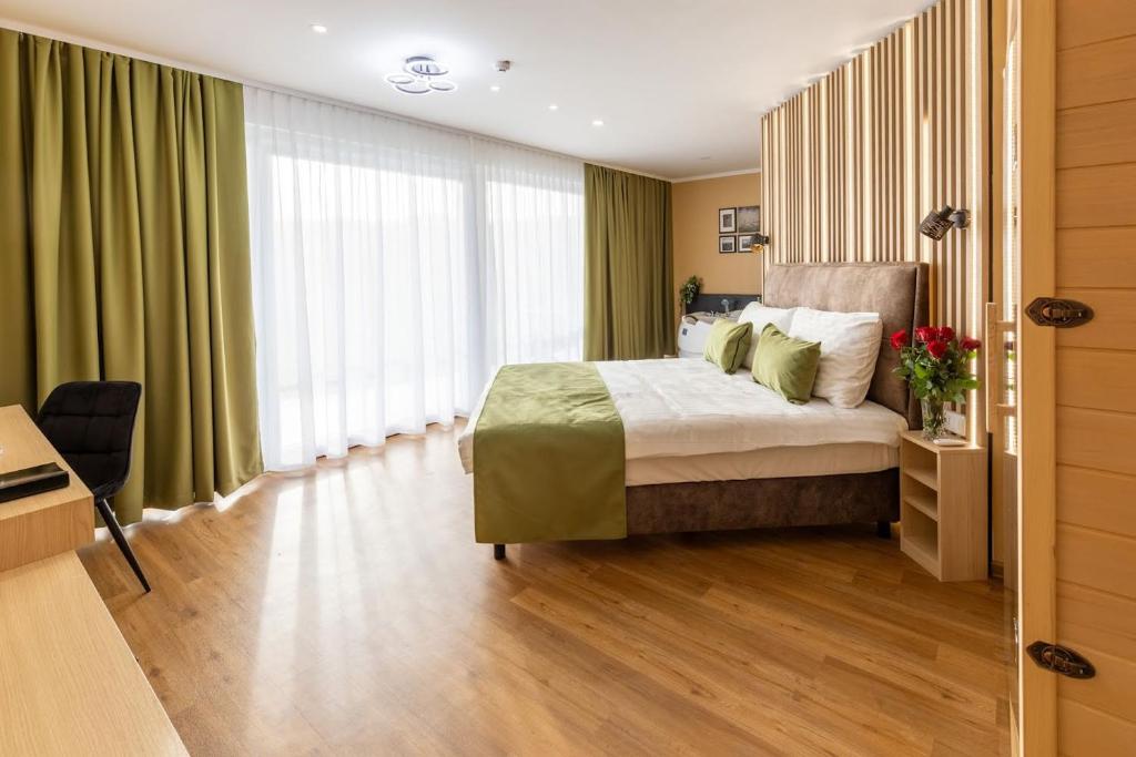 Postel nebo postele na pokoji v ubytování Hotel Dolenjc