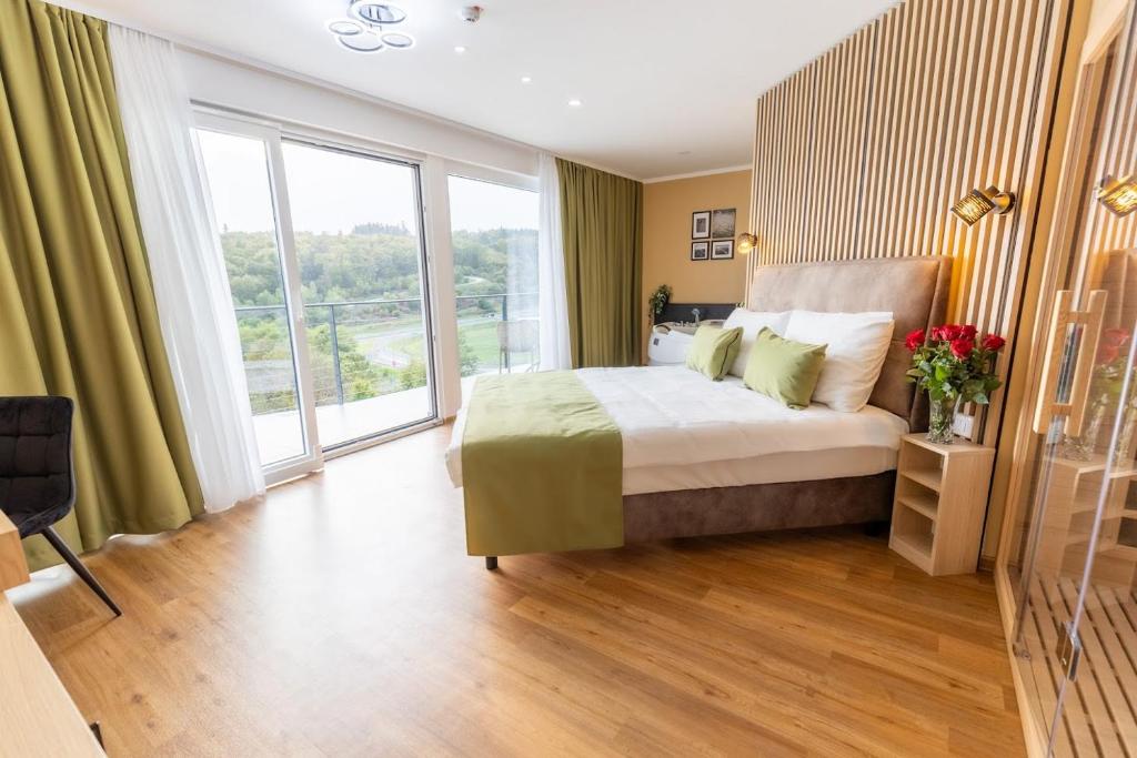 Postel nebo postele na pokoji v ubytování Hotel Dolenjc