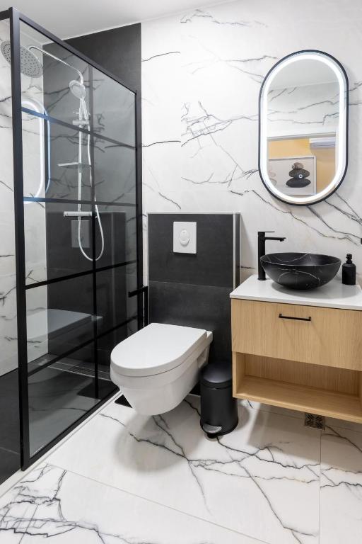 Koupelna v ubytování Hotel Dolenjc