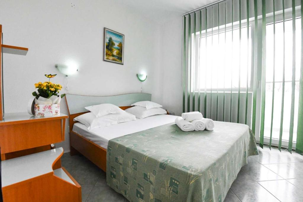 Postel nebo postele na pokoji v ubytování COMPLEX TISMANA 3* ALL INCLUSIVE