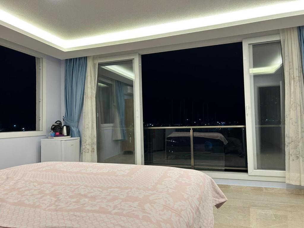 Postel nebo postele na pokoji v ubytování Mert Homes Marmaris
