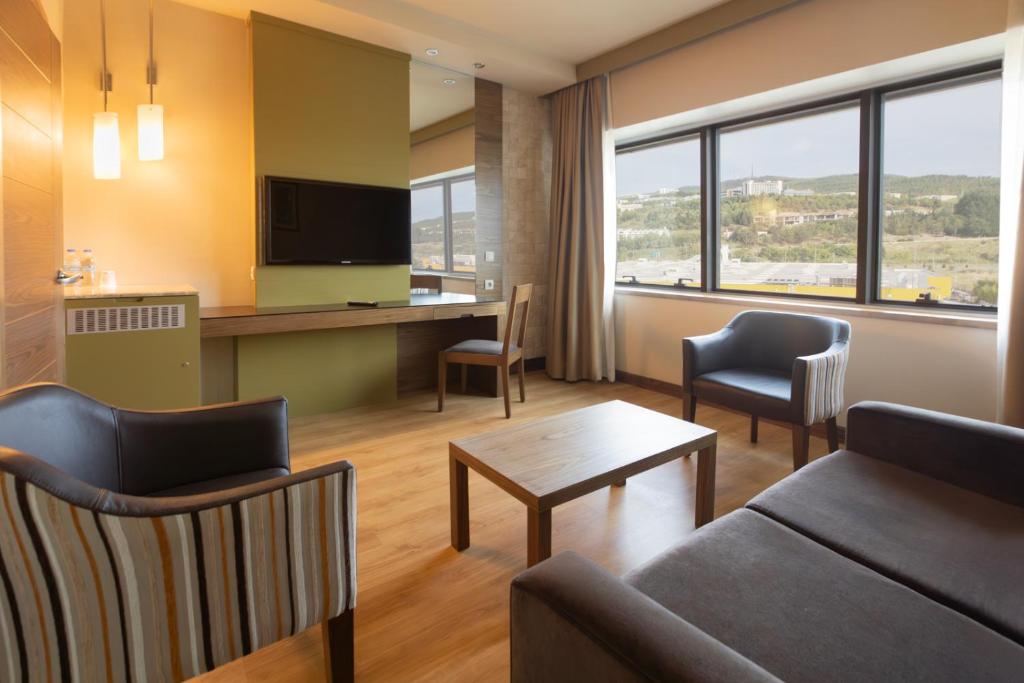 TV a/nebo společenská místnost v ubytování Kolin Hotel Spa & Convention Center