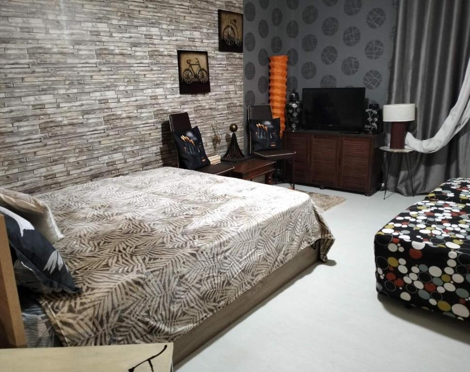 Łóżko lub łóżka w pokoju w obiekcie Velvet story