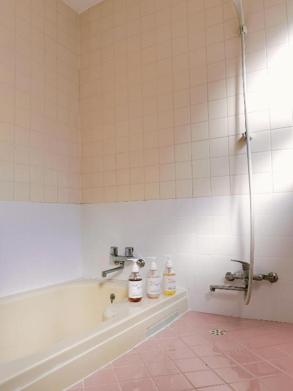 Koupelna v ubytování Retro Villa Fooga 昭和町屋貸切 風雅