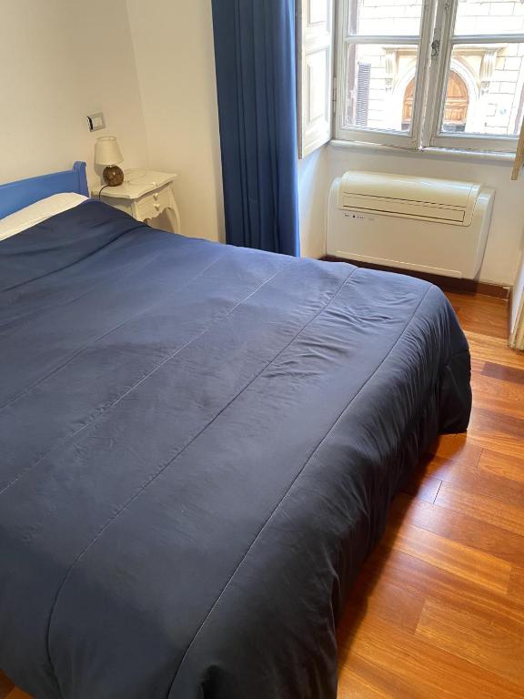 A bed or beds in a room at Bed and Breakfast Adduci's House