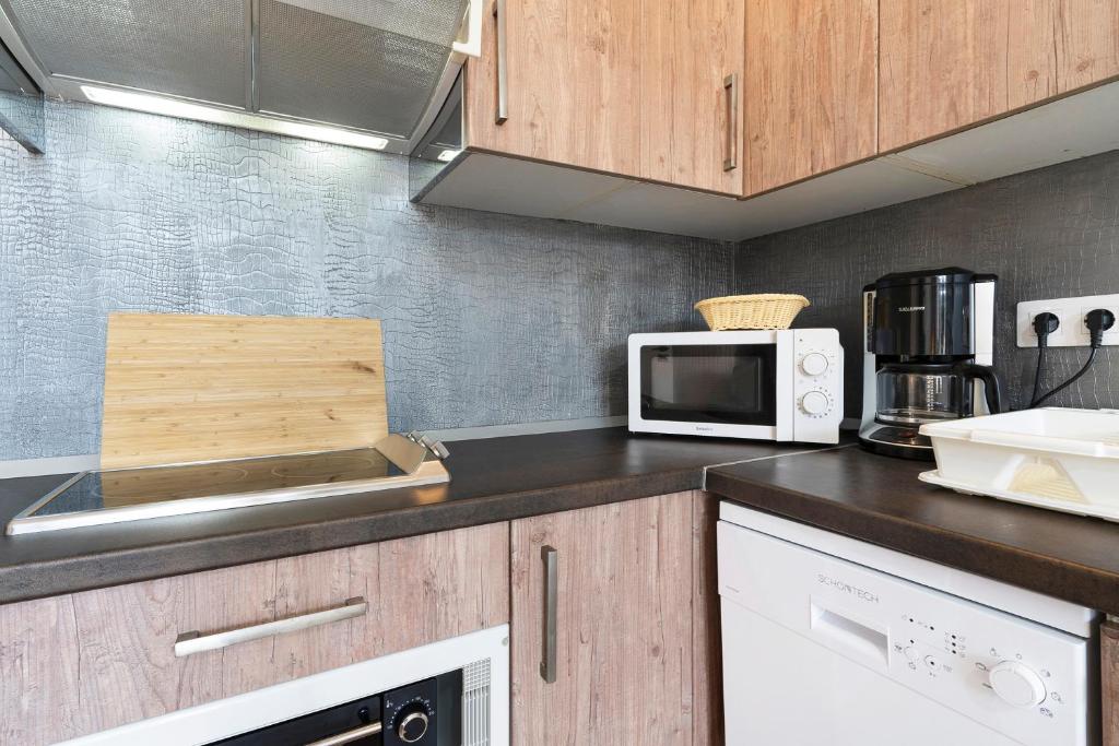 Kuchyň nebo kuchyňský kout v ubytování Bungalow Green Oasis