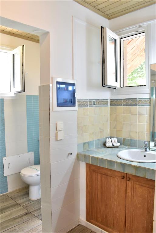 Koupelna v ubytování Simatos αpARTments & Studios
