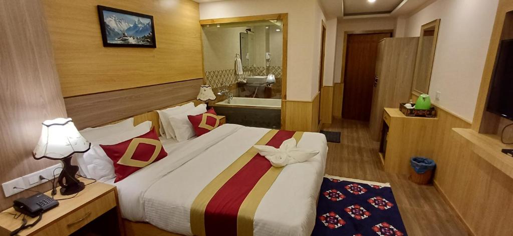 Postel nebo postele na pokoji v ubytování Hotel Yakroo Manang