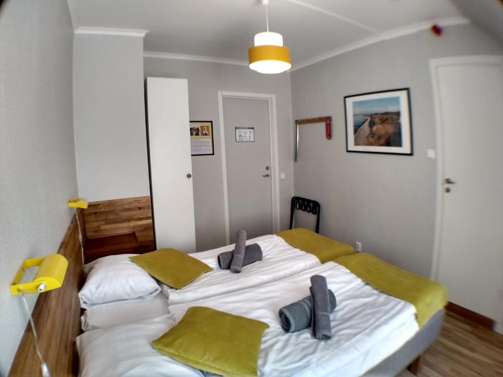 Postel nebo postele na pokoji v ubytování Slite Badhotell