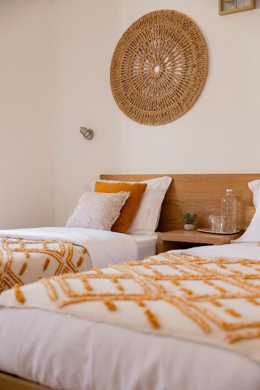 Postel nebo postele na pokoji v ubytování Jasmine Hotel
