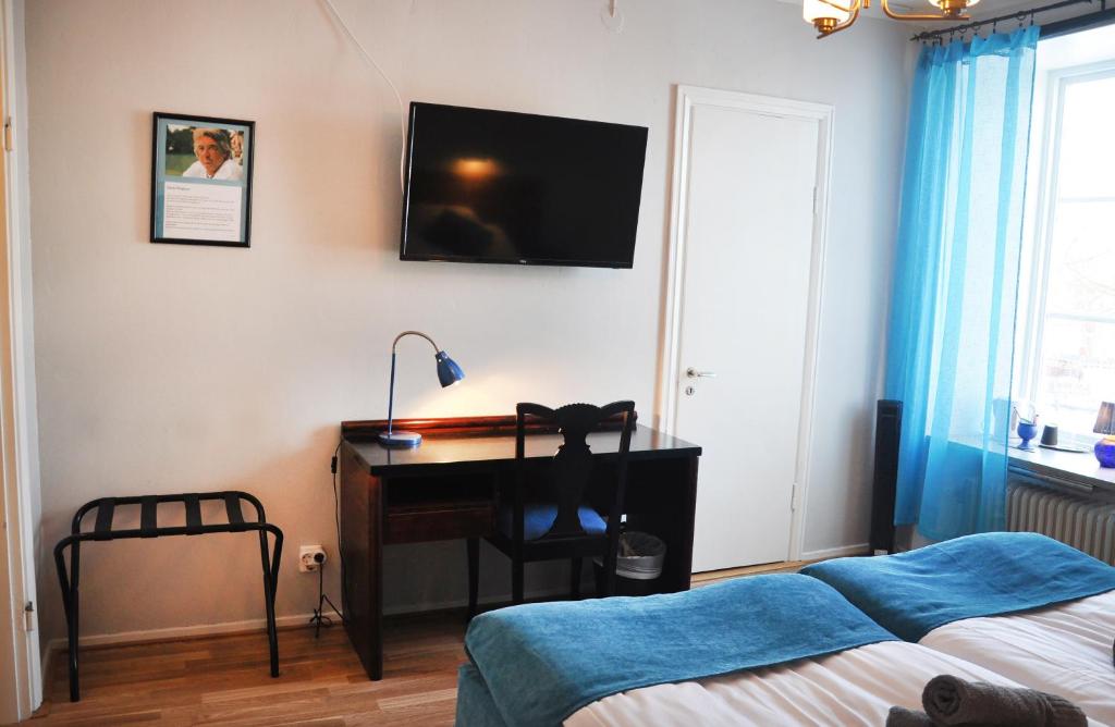 Postel nebo postele na pokoji v ubytování Slite Badhotell