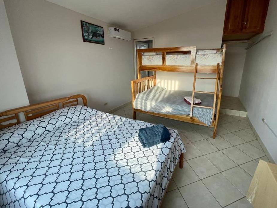 Postel nebo postele na pokoji v ubytování Hostal Cabañas Vistamar