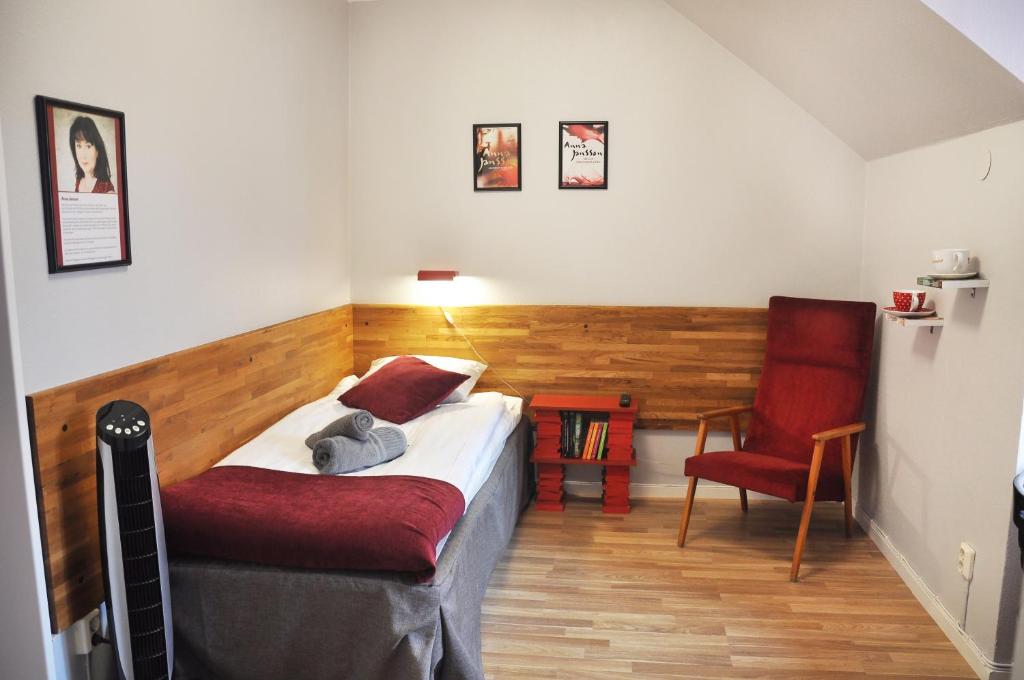 Postel nebo postele na pokoji v ubytování Slite Badhotell