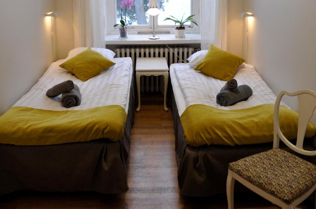 Postel nebo postele na pokoji v ubytování Slite Badhotell