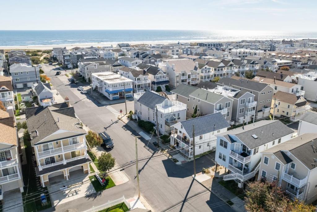 an aerial view of a city with houses and the ocean at Beach Block-1min Walk-Luxury-The Reef Upstairs in Ocean City