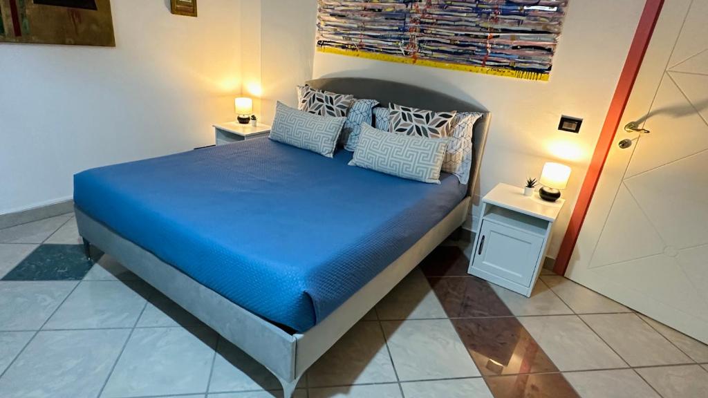 Posteľ alebo postele v izbe v ubytovaní Amarin Pisa Apartment