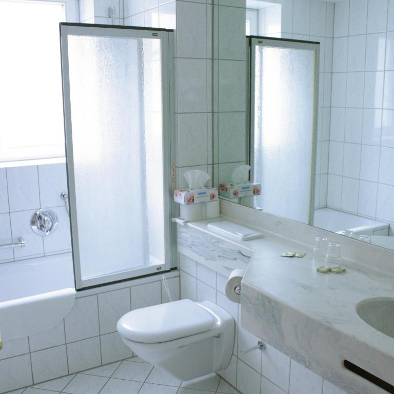 Koupelna v ubytování Hotel Kurparkblick