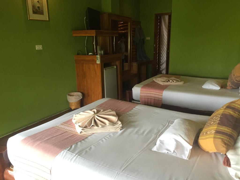 Postel nebo postele na pokoji v ubytování Phu Pha Nam Resort