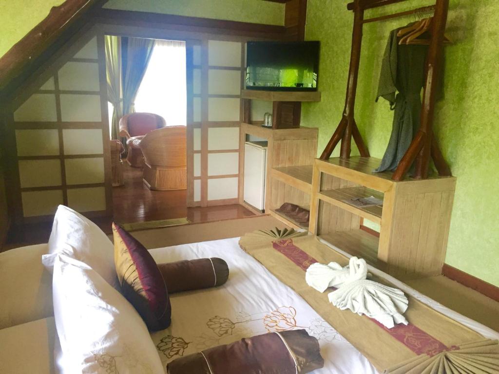 Postel nebo postele na pokoji v ubytování Phu Pha Nam Resort