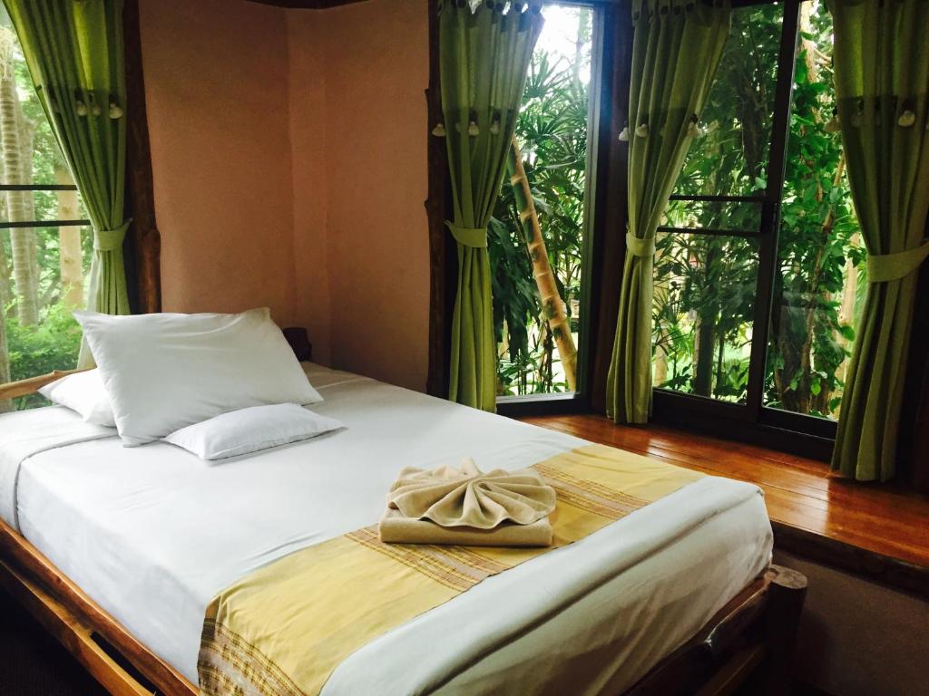 Postel nebo postele na pokoji v ubytování Phu Pha Nam Resort