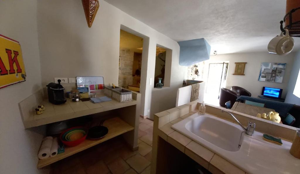 a bathroom with a sink and a counter top at Charming Village Getaway in Bonnieux in Bonnieux