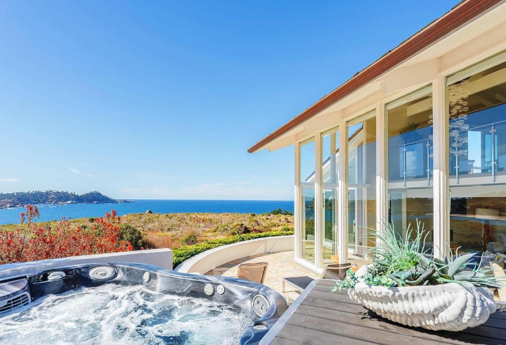 a bath tub sitting outside of a house at 3911 Point Lobos View home in Carmel