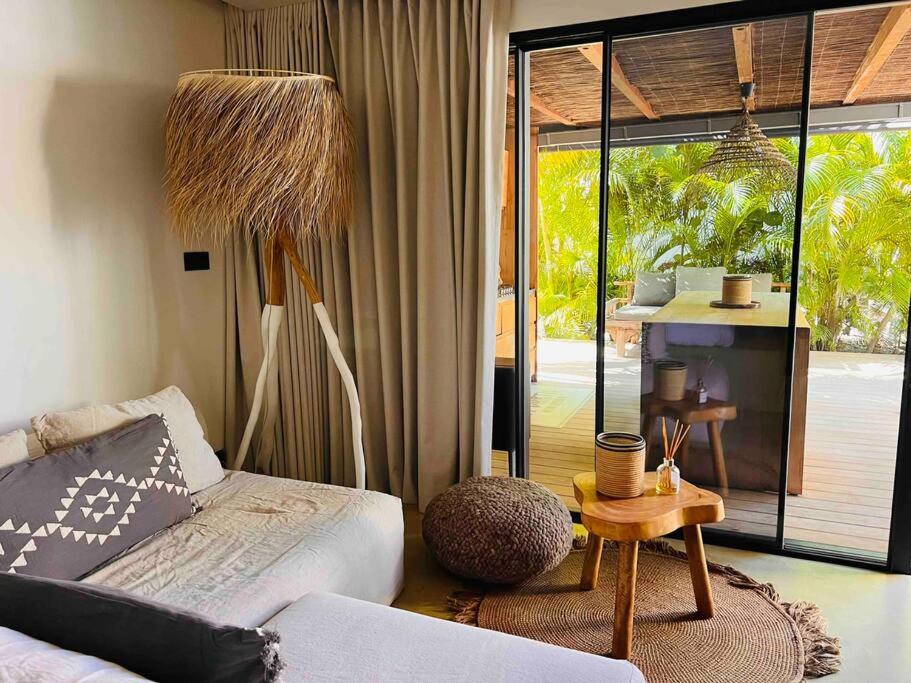 Postel nebo postele na pokoji v ubytování Le Bungalow Gypset