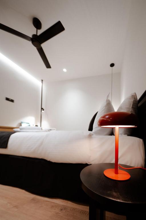 Postel nebo postele na pokoji v ubytování Nostos - Luxury Apartment in Agrinio