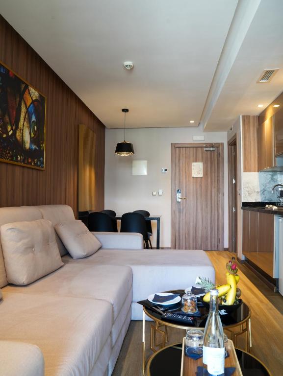 Kuchyň nebo kuchyňský kout v ubytování First Suites Hôtel