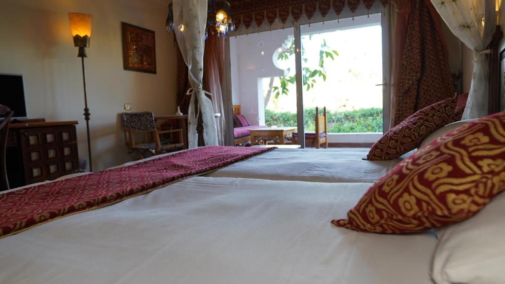 Postel nebo postele na pokoji v ubytování Private Coral Suite & kitchen in Sharm-el-Sheikh