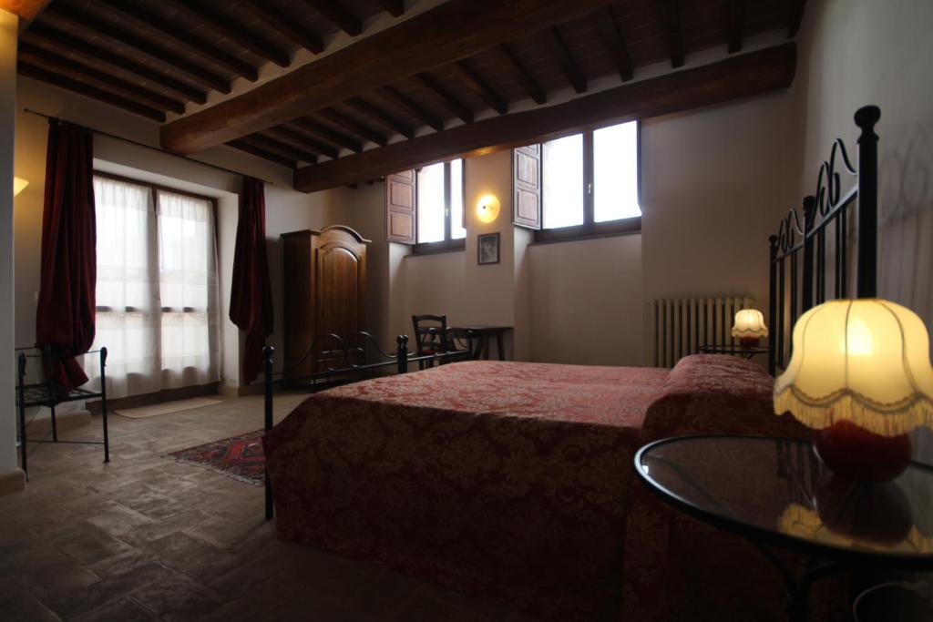 Ένα ή περισσότερα κρεβάτια σε δωμάτιο στο Residenza Sant'Agnese