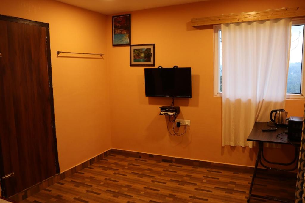 TV a/nebo společenská místnost v ubytování LAZY RETREAT