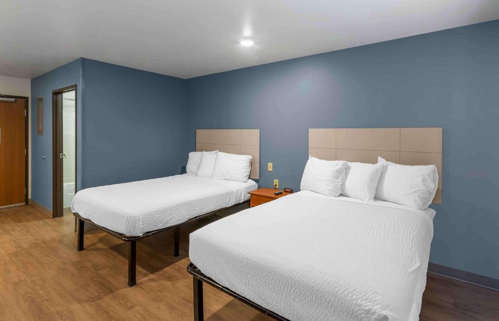 Postel nebo postele na pokoji v ubytování Extended Stay America Select Suites - Ogden