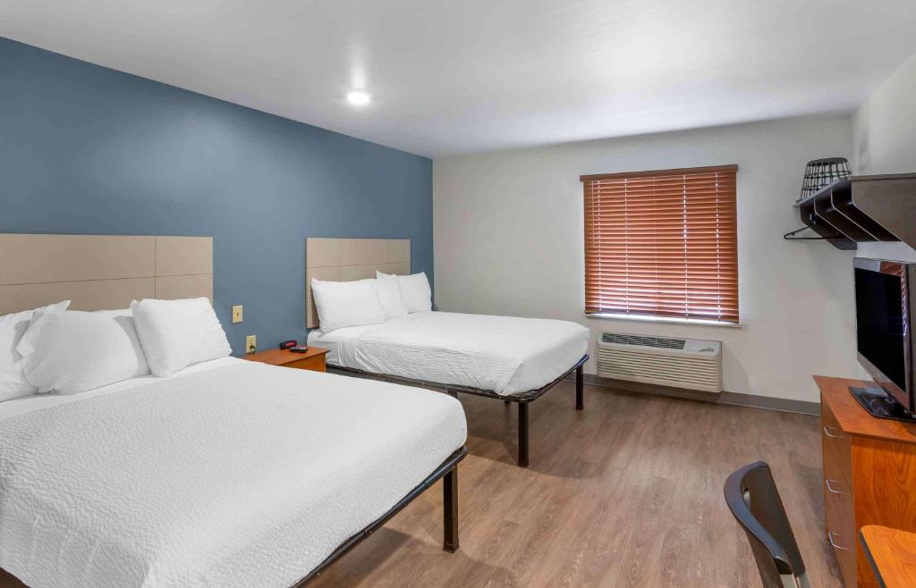 Postel nebo postele na pokoji v ubytování Extended Stay America Select Suites - Ogden
