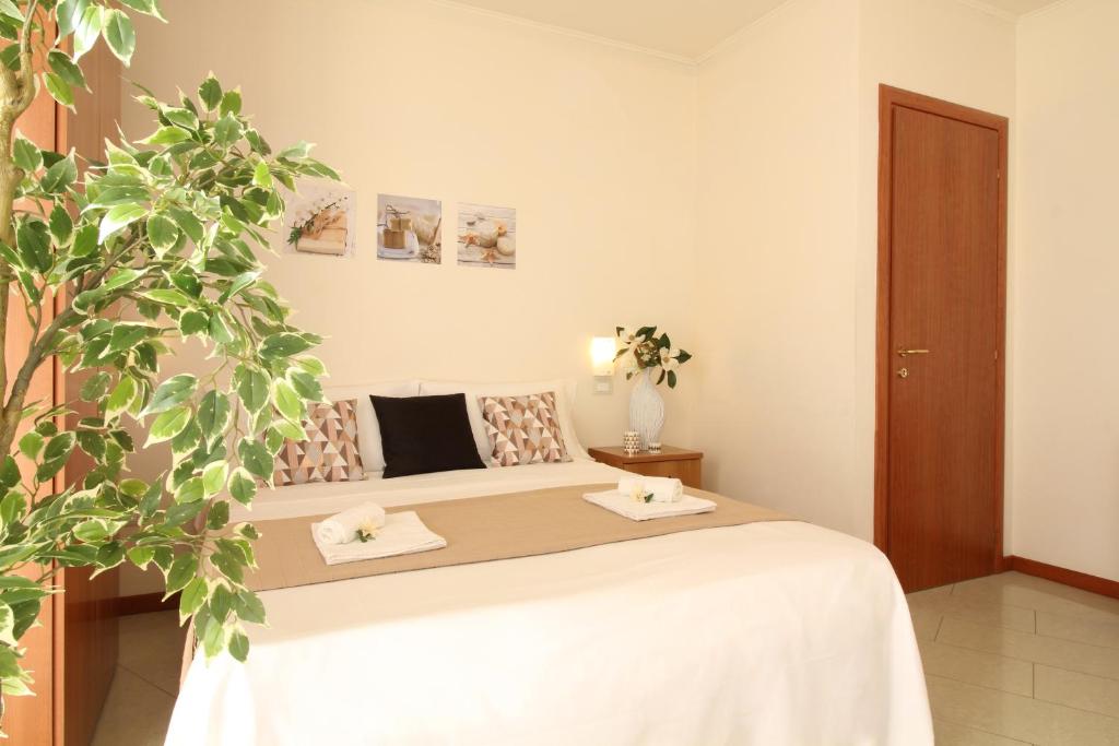 Postel nebo postele na pokoji v ubytování Residence Altamarea