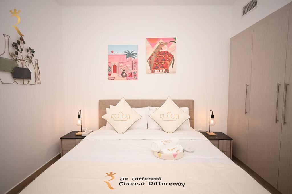 Postelja oz. postelje v sobi nastanitve Charming Rossa 1BR Getaway Yas Island