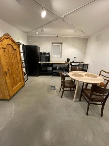 Kuchyň nebo kuchyňský kout v ubytování Tiny House, podkrovní apartmán a apartmán s výhledem do zahrady