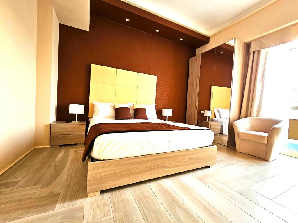 Postel nebo postele na pokoji v ubytování Trilogy Prestige - Central Premium Suites