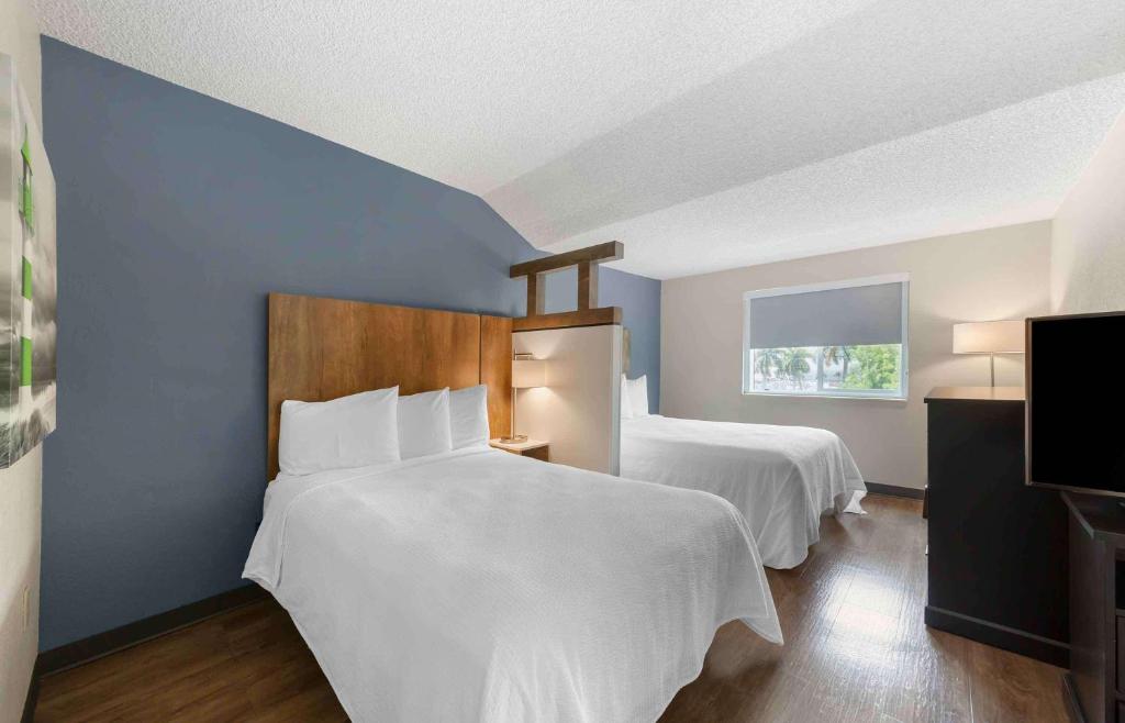 Postel nebo postele na pokoji v ubytování Extended Stay America Premier Suites - Miami - Airport - Miami Springs